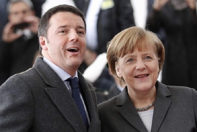 renzi e merkel a maranello Renzi accoglie la Merkel a Maranello per un vertice Italia-Germania